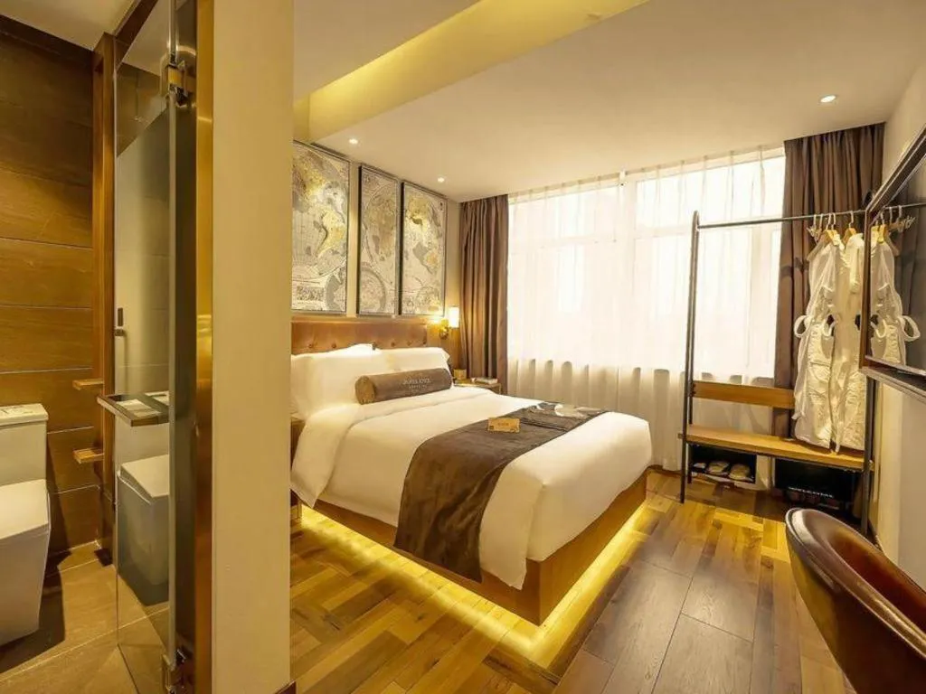 Bed in James Joyce Coffetel Shenyang North Railway Station Qishan Road Metro Station