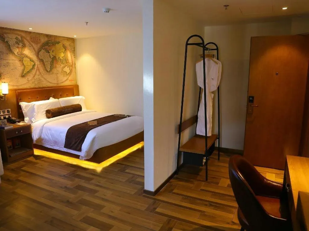 Bed in James Joyce Coffetel Shenyang North Railway Station Qishan Road Metro Station