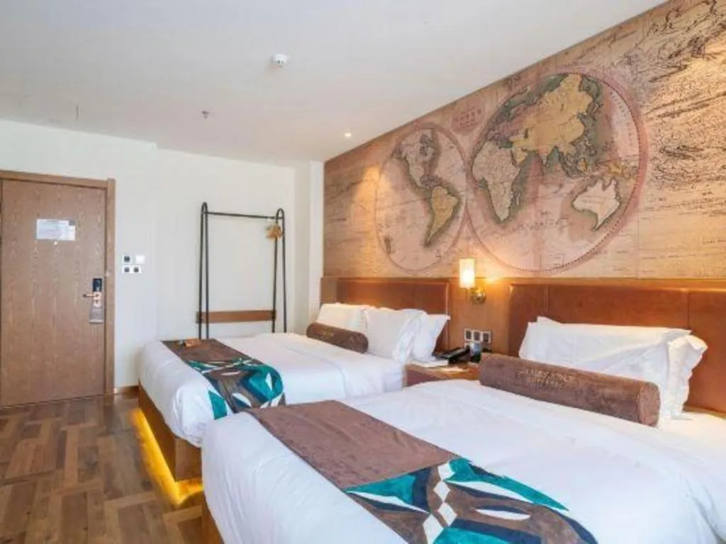 Bed in James Joyce Coffetel Shenyang North Railway Station Qishan Road Metro Station