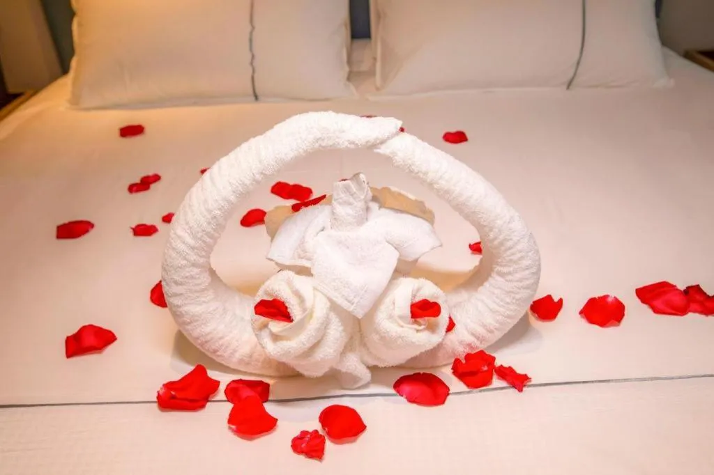 Bed in Magnotel Hotel Dongxing Guomen Port