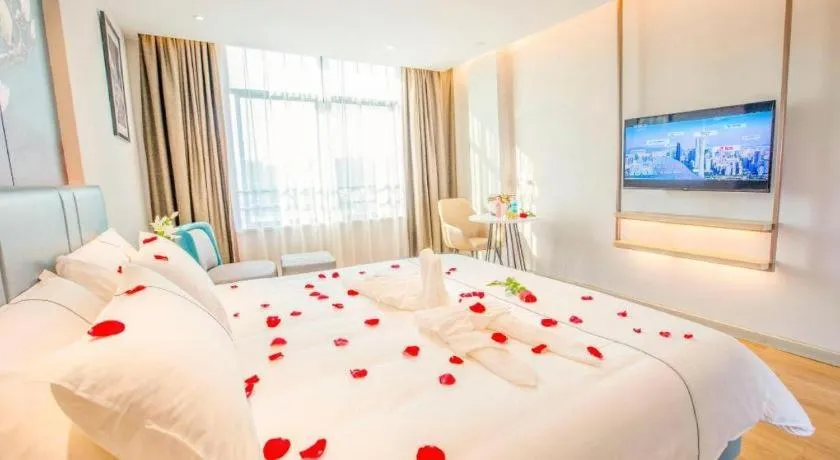 Bed in Magnotel Hotel Dongxing Guomen Port