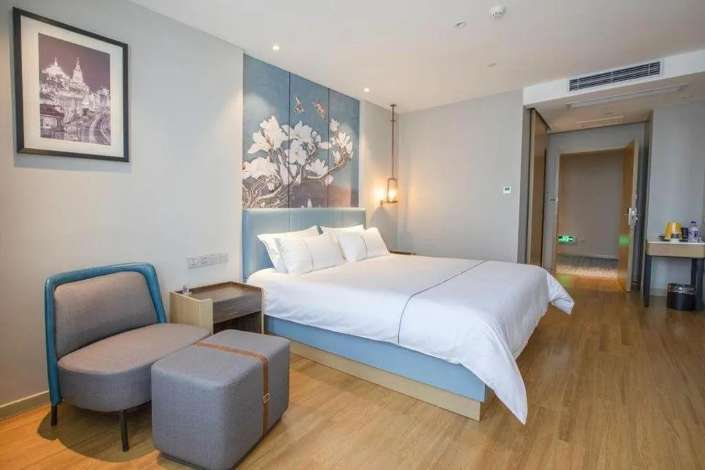 Bed in Magnotel Hotel Dongxing Guomen Port