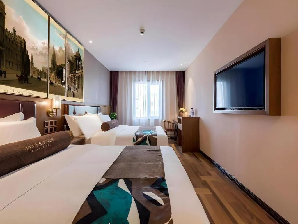 Bed in James Joyce Coffetel Beijing West Railway Station Lianhua Bridge