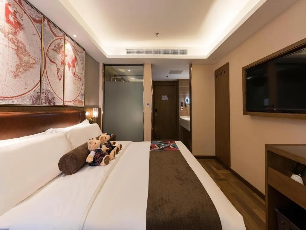 Bed in James Joyce Coffetel Beijing West Railway Station Lianhua Bridge