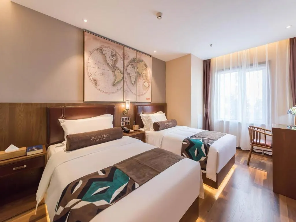 Bed in James Joyce Coffetel Beijing West Railway Station Lianhua Bridge