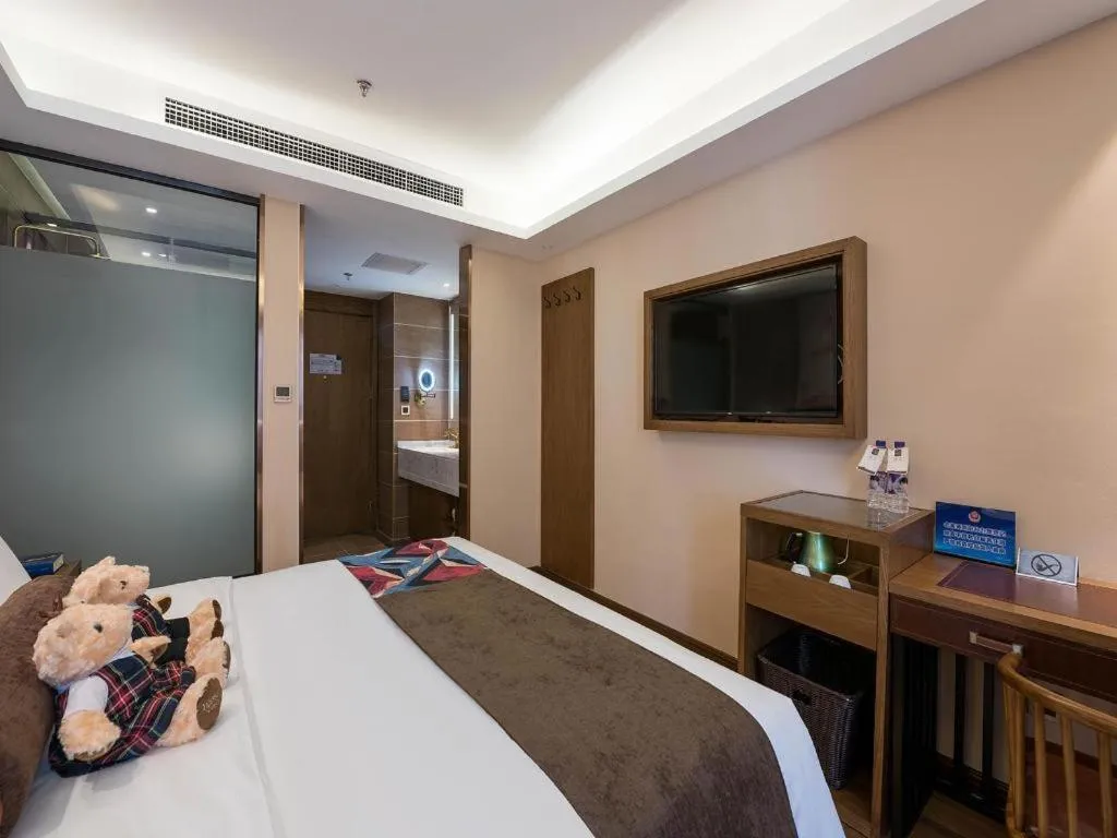 Bed in James Joyce Coffetel Beijing West Railway Station Lianhua Bridge