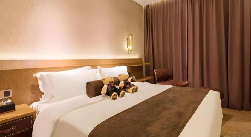 Bed in James Joyce Coffetel Beijing West Railway Station Lianhua Bridge