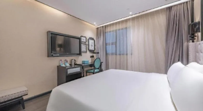 Bed in Xana Hotelle Zhuhai Gongbei Port