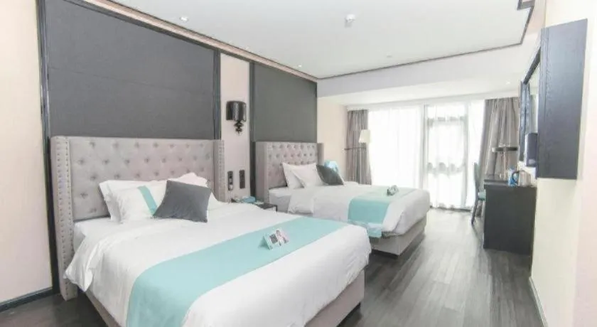 Bed in Xana Hotelle Zhuhai Gongbei Port
