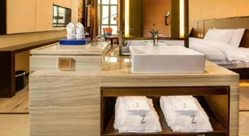 Bed in Zmax Hotel Guangzhou Railway Station