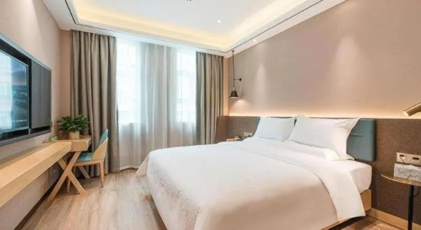 Bed in Zmax Hotel Guangzhou Railway Station