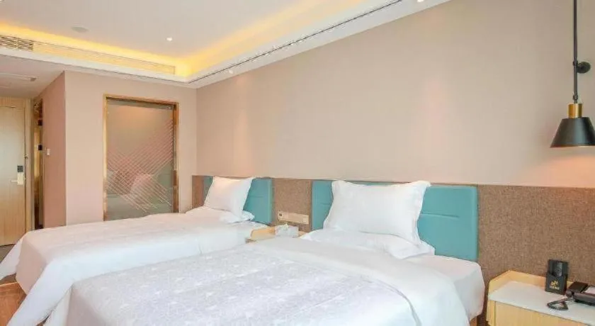Bed in Zmax Hotel Guangzhou Railway Station