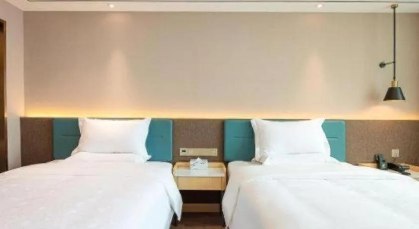 Bed in Zmax Hotel Guangzhou Railway Station