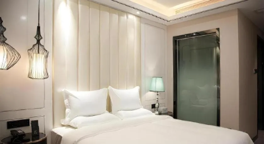 Bed in Zmax Hotel Guangzhou Railway Station