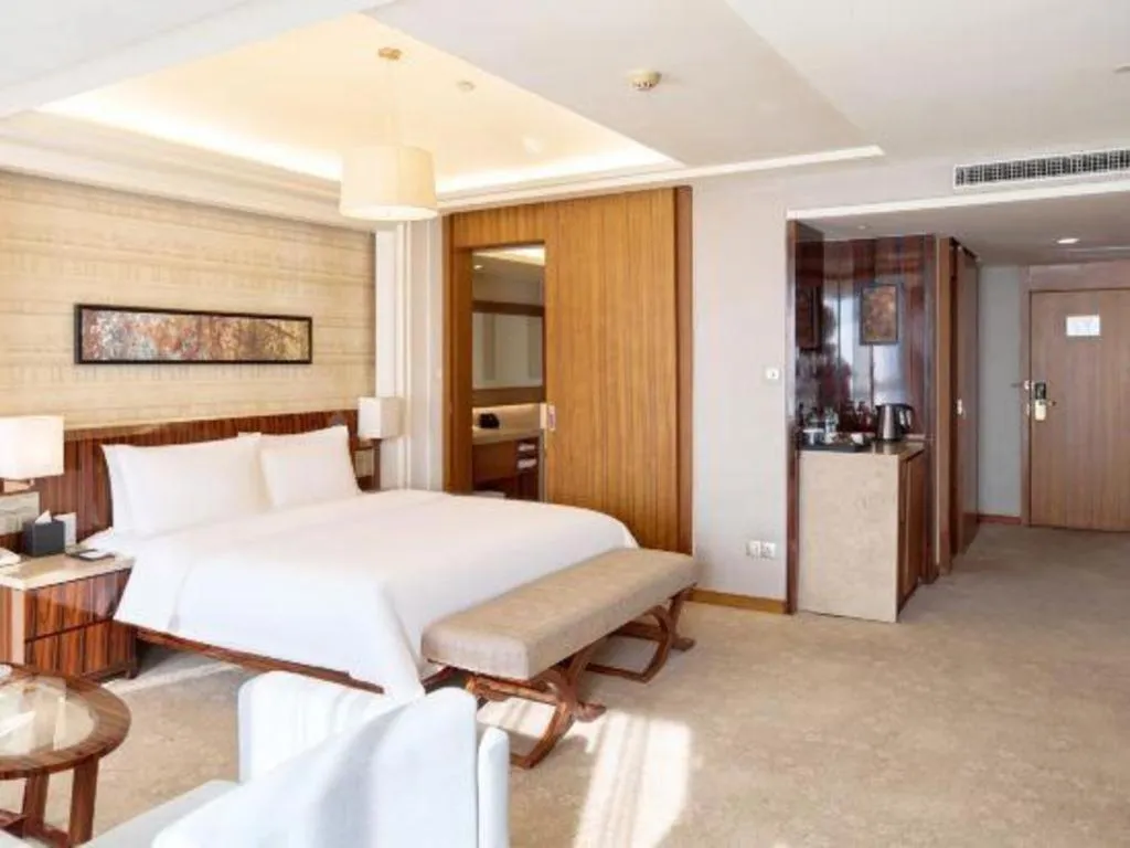 Bed in YUN-RAY Ambassador Hotel