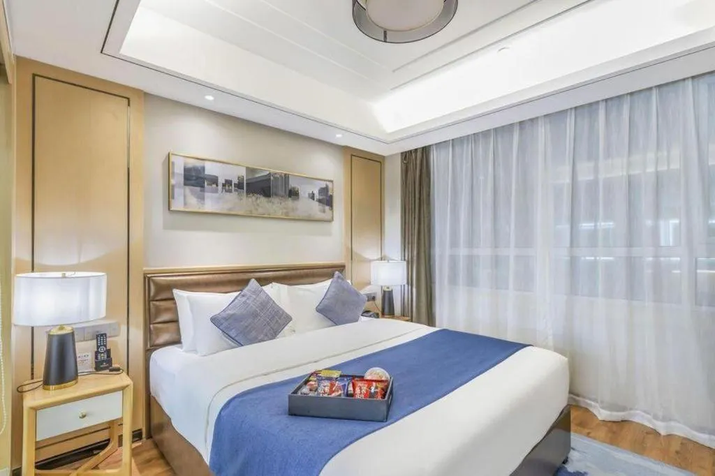 Bed in YUN-RAY Ambassador Hotel