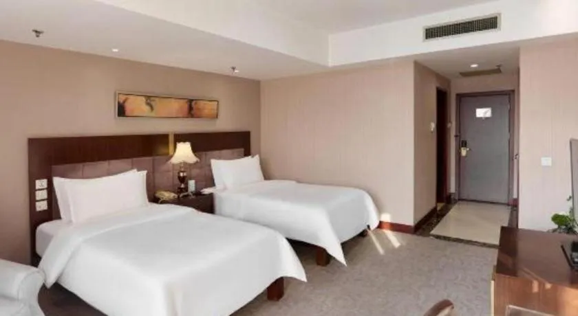 Bed in YUN-RAY Ambassador Hotel