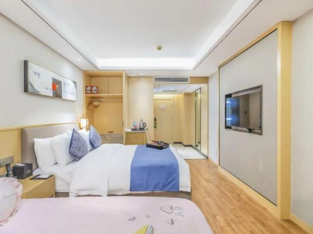 Bed in YUN-RAY Ambassador Hotel