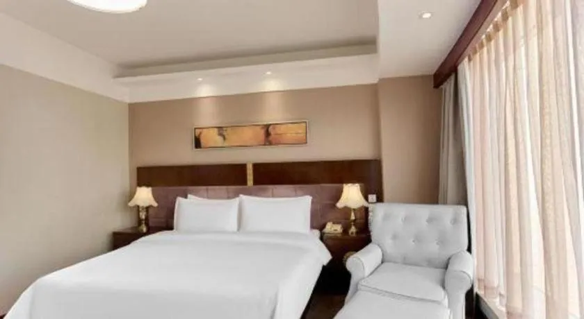 Bed in YUN-RAY Ambassador Hotel