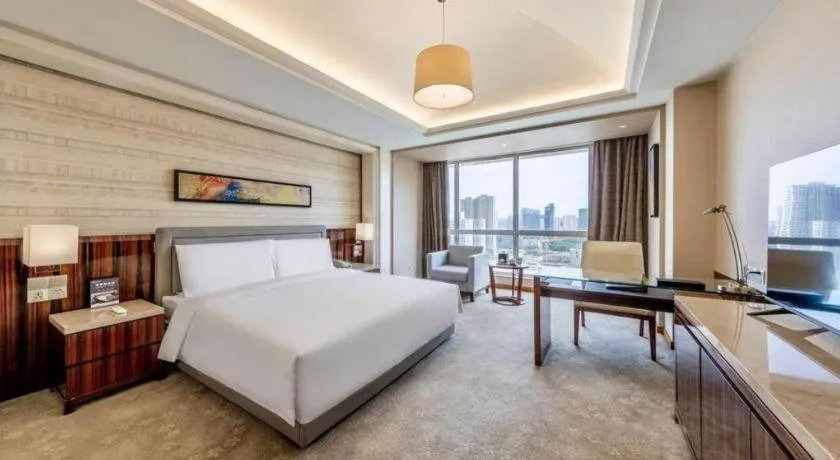 Bed in YUN-RAY Ambassador Hotel