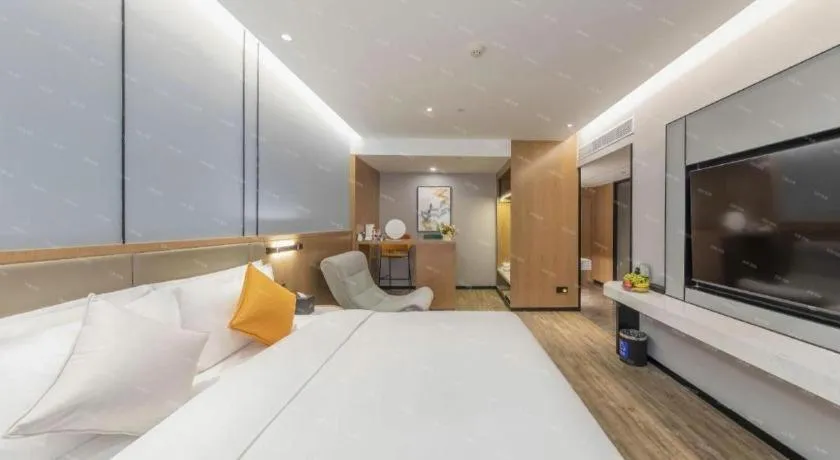 Bed in YUN-RAY Ambassador Hotel