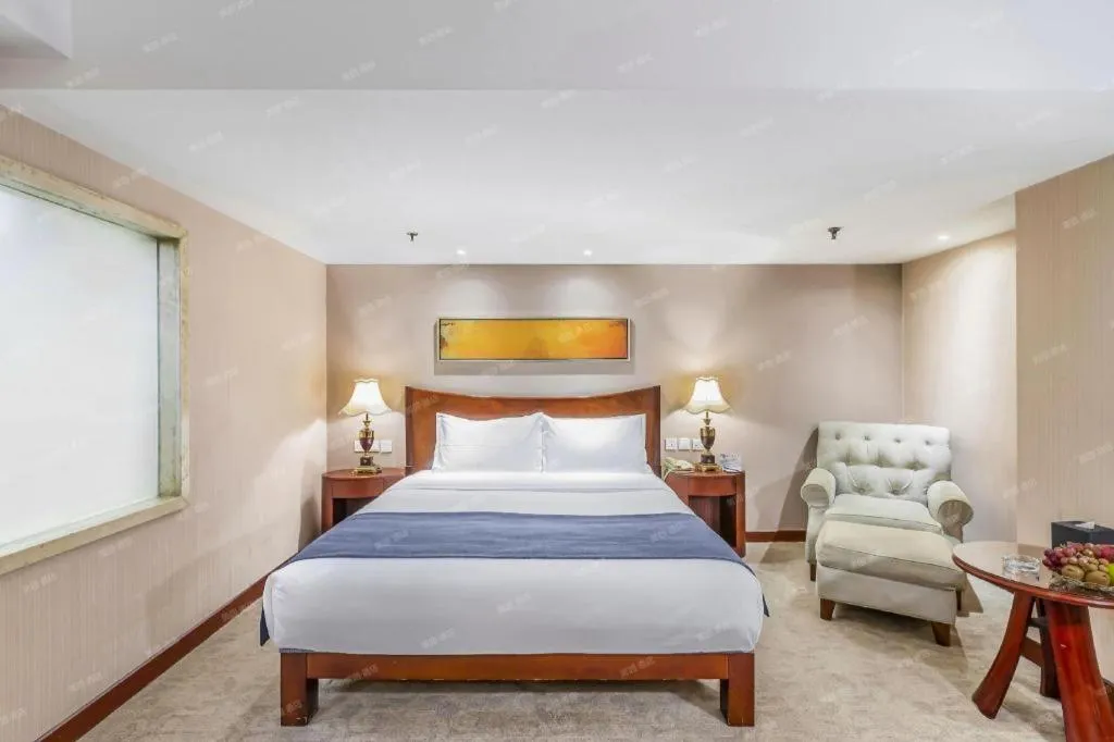 Bed in YUN-RAY Ambassador Hotel