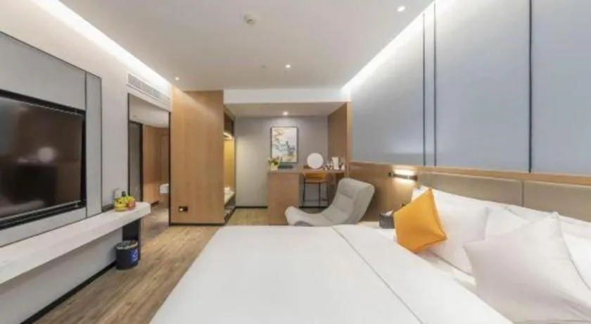 Bed in YUN-RAY Ambassador Hotel