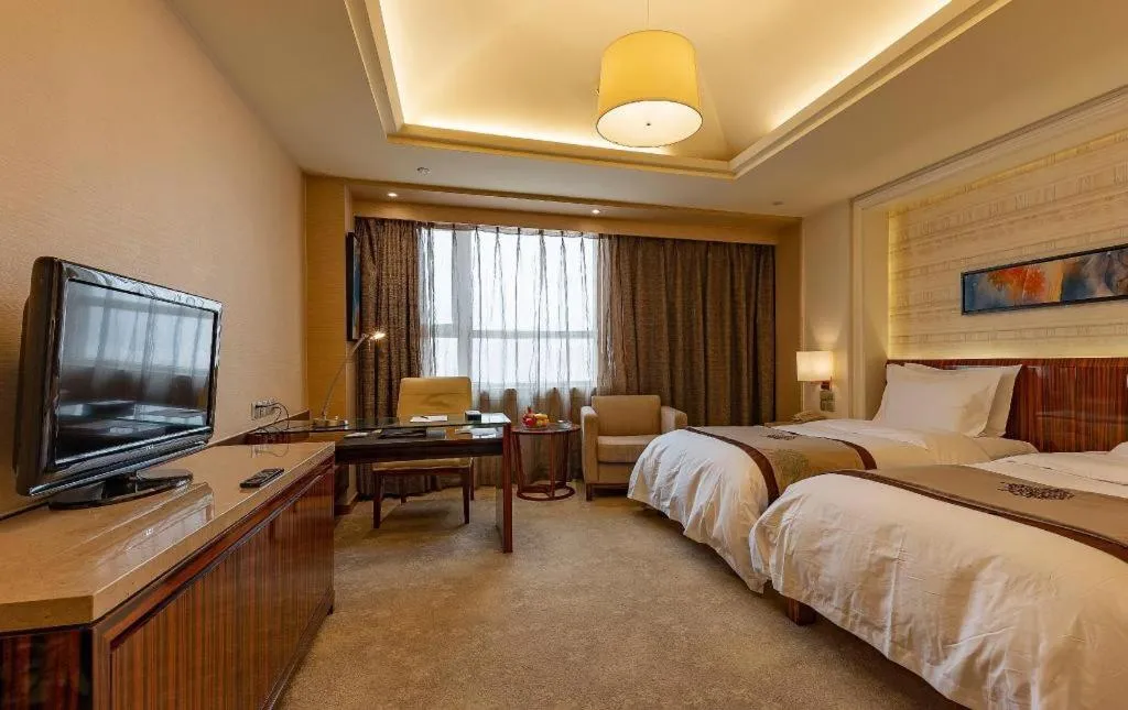 Bed in YUN-RAY Ambassador Hotel