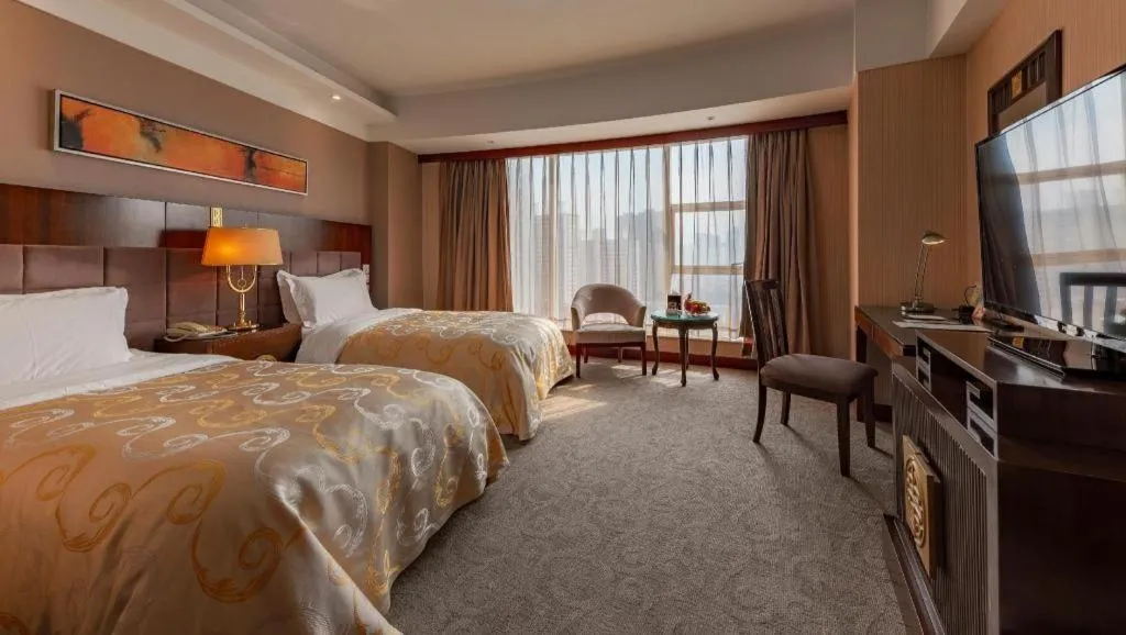 Bed in YUN-RAY Ambassador Hotel