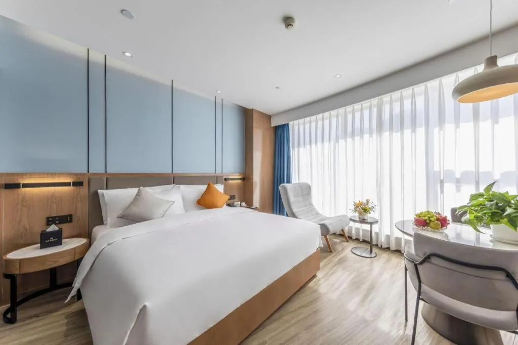 Bed in YUN-RAY Ambassador Hotel