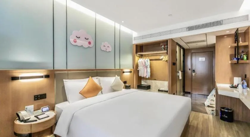 Bed in YUN-RAY Ambassador Hotel