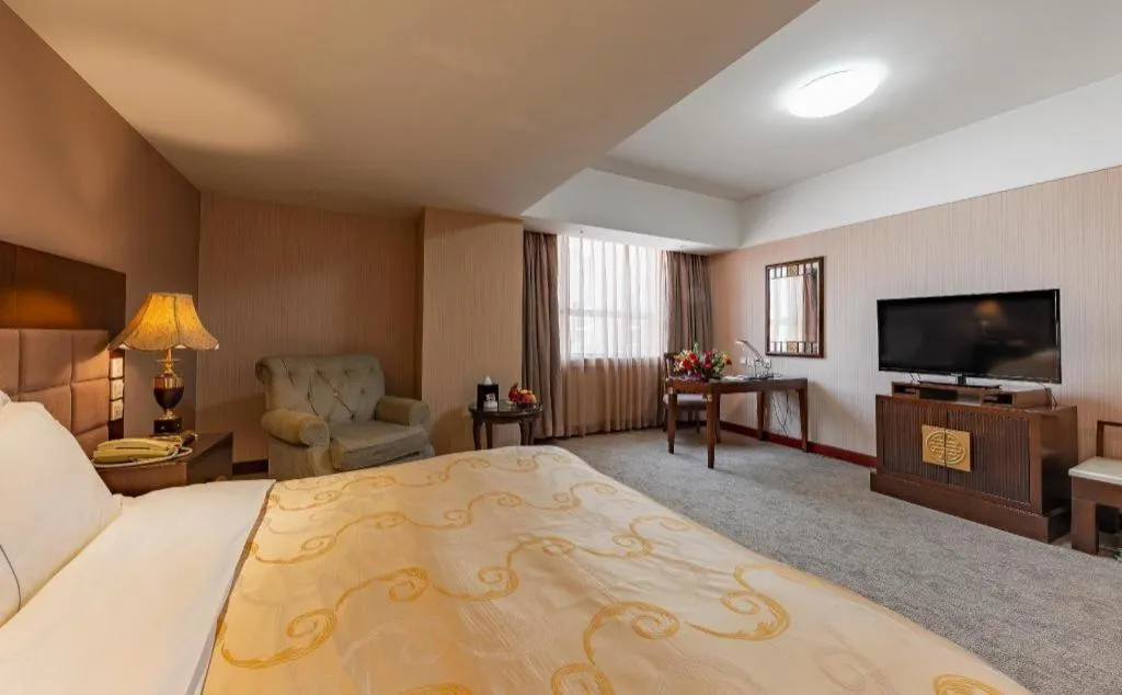 Bed in YUN-RAY Ambassador Hotel