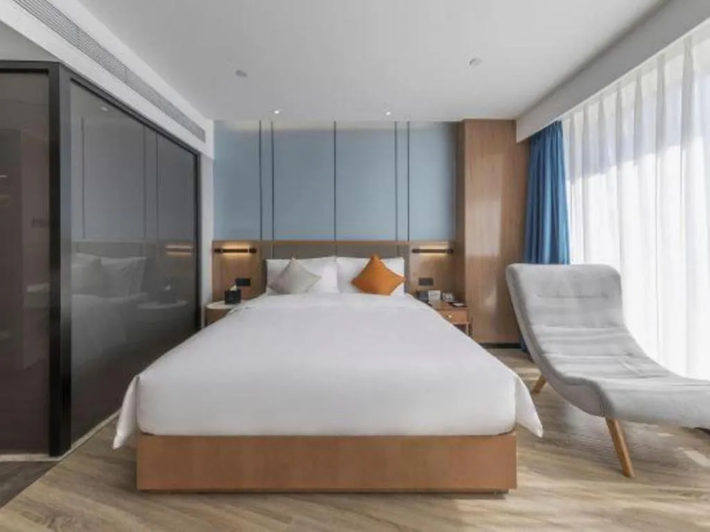 Bed in YUN-RAY Ambassador Hotel