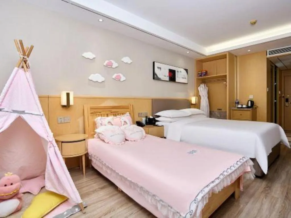 Bed in YUN-RAY Ambassador Hotel