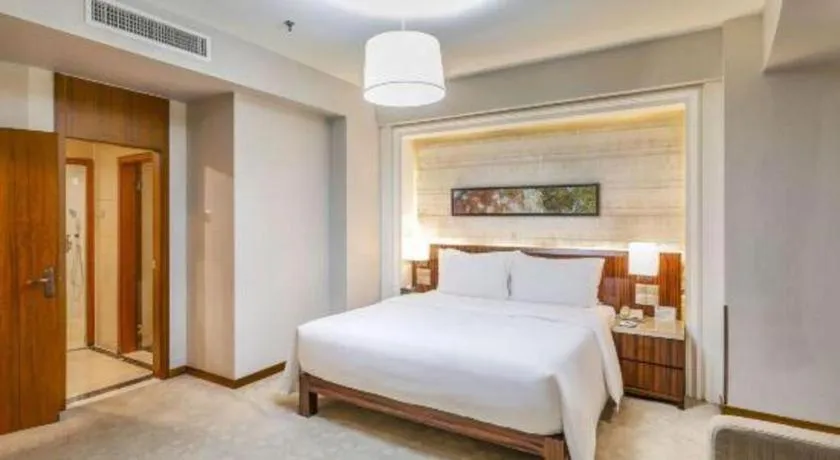 Bed in YUN-RAY Ambassador Hotel