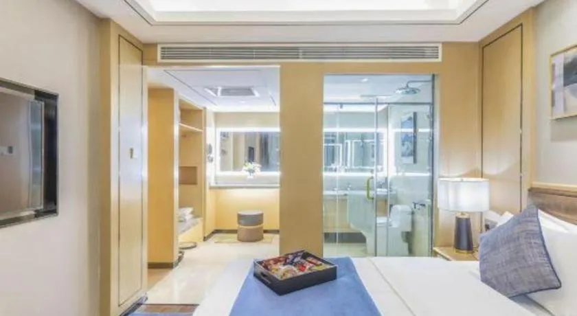 Bed in YUN-RAY Ambassador Hotel