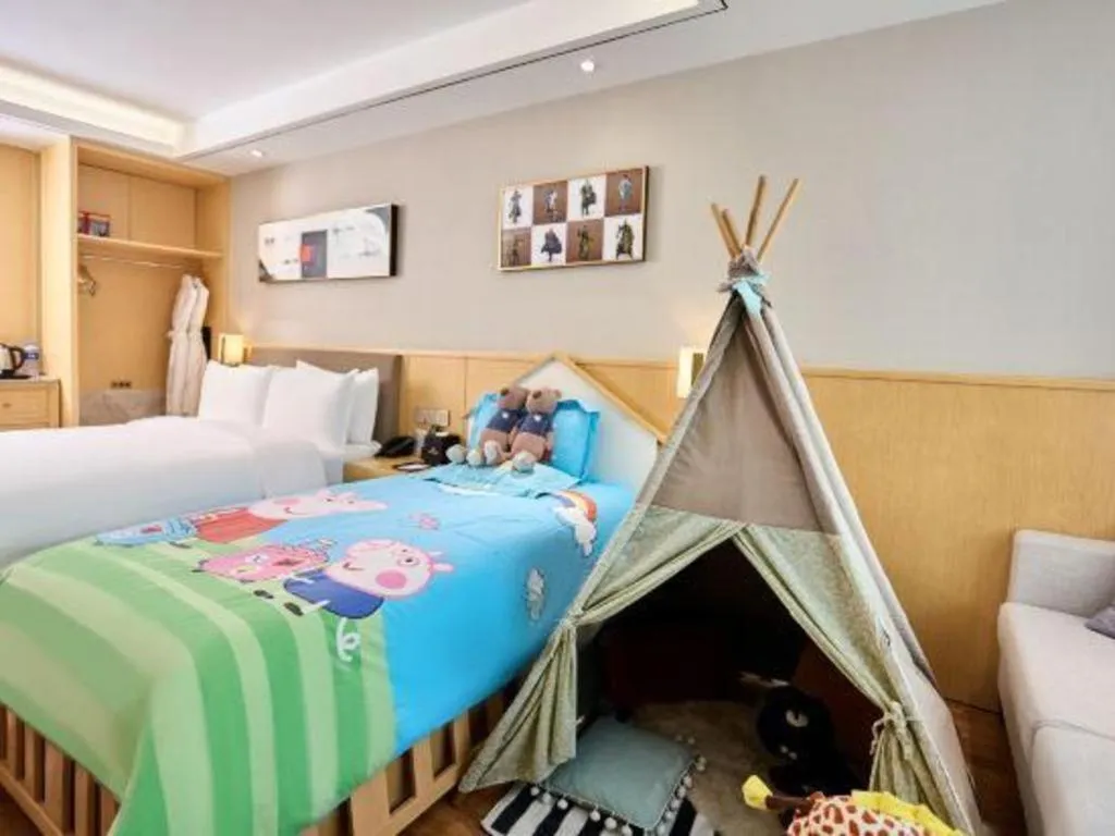 Bed in YUN-RAY Ambassador Hotel