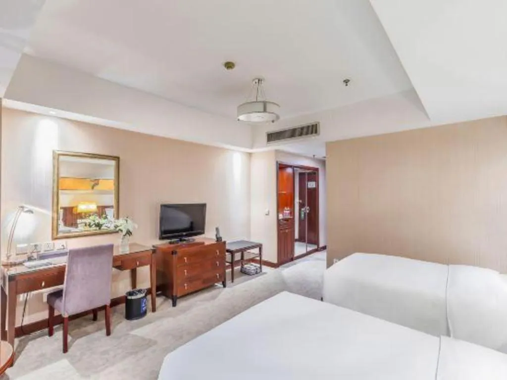 Bed in YUN-RAY Ambassador Hotel