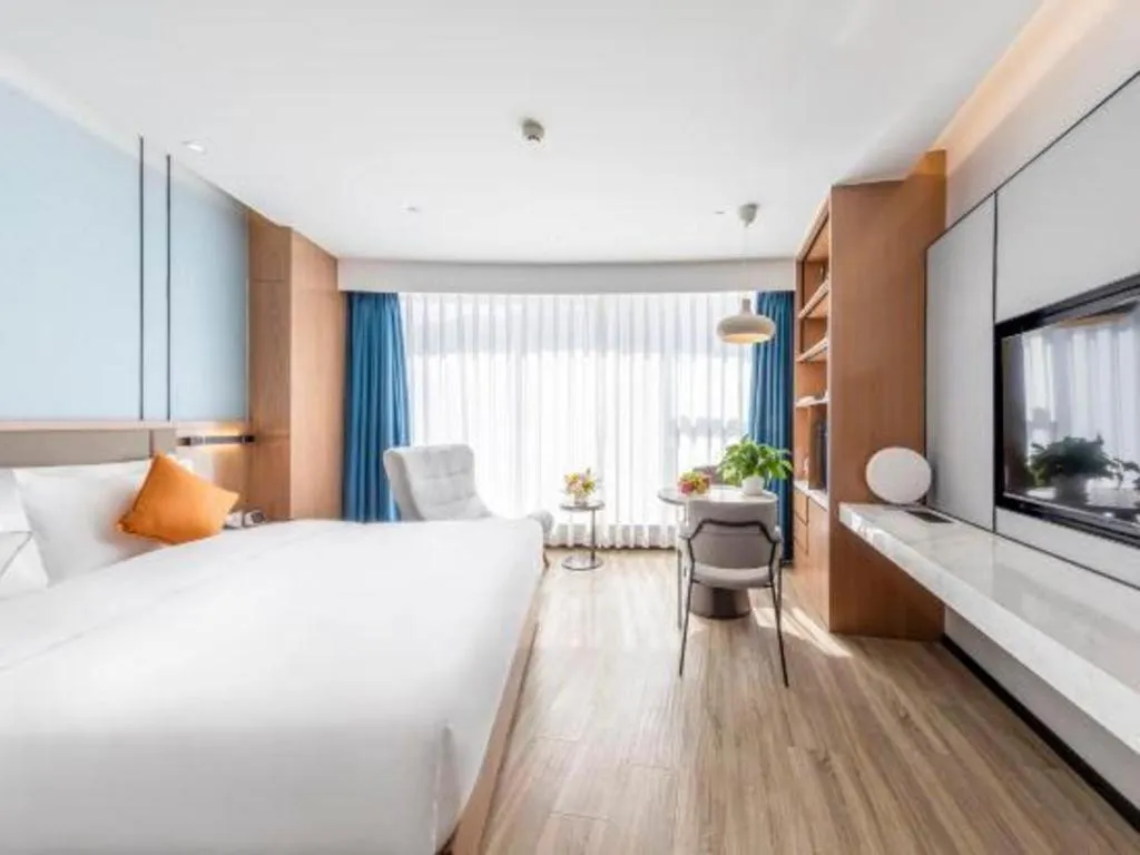 Bed in YUN-RAY Ambassador Hotel