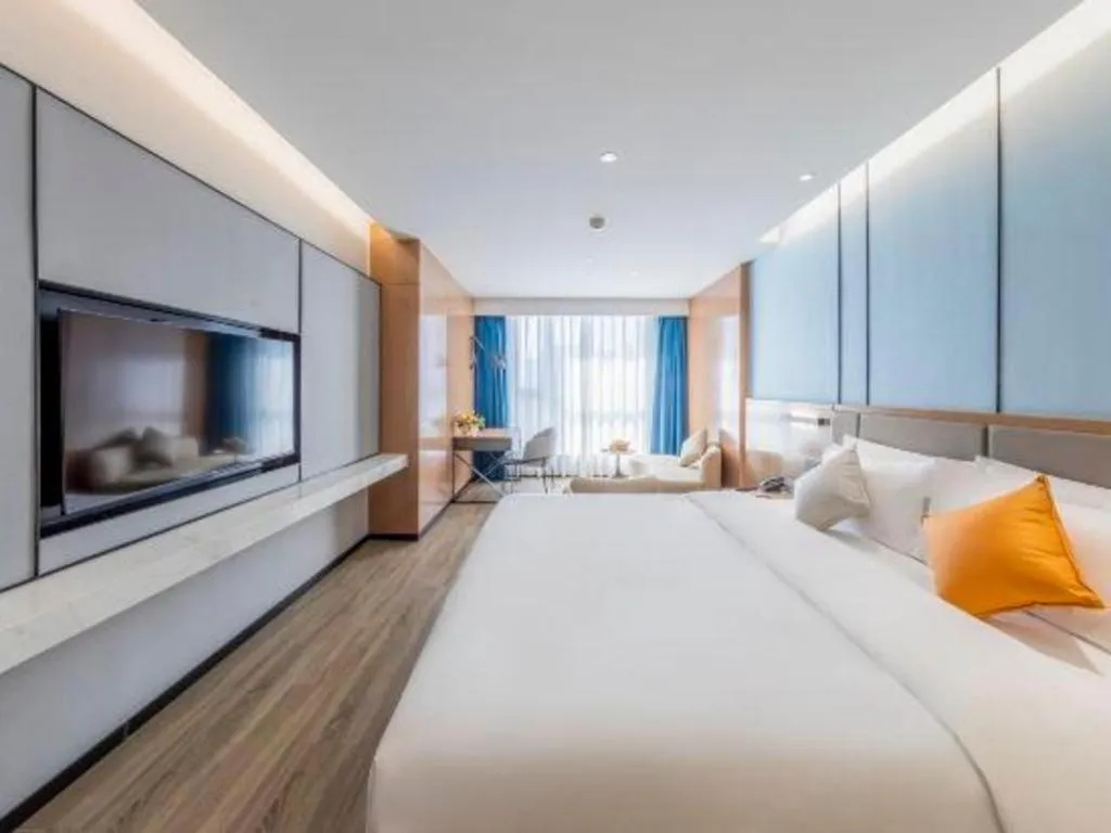 Bed in YUN-RAY Ambassador Hotel