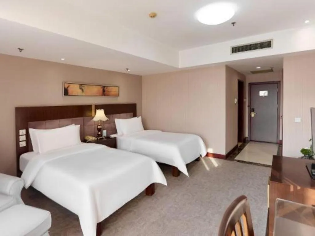 Bed in YUN-RAY Ambassador Hotel