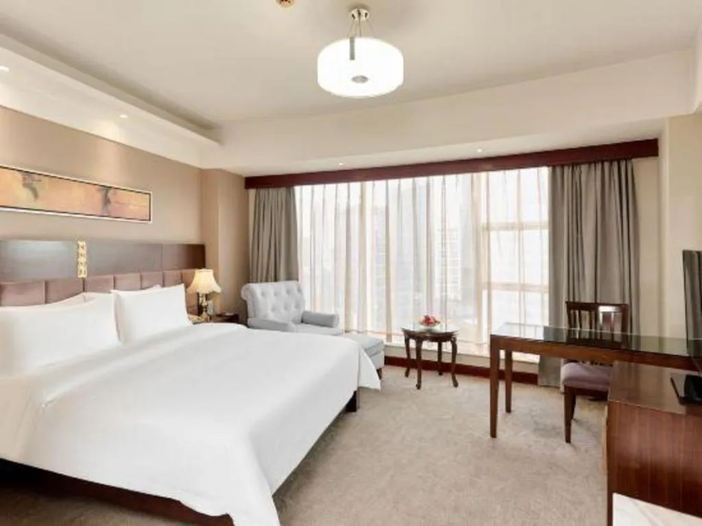 Bed in YUN-RAY Ambassador Hotel