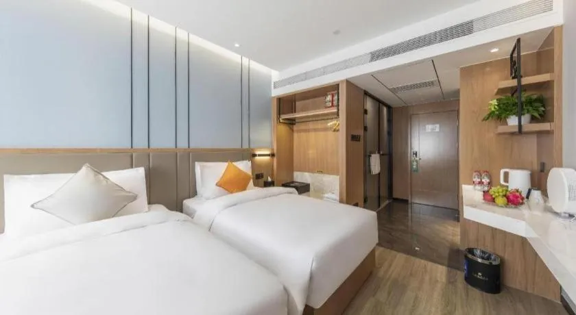 Bed in YUN-RAY Ambassador Hotel