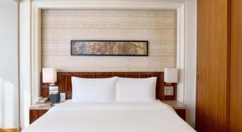 Bed in YUN-RAY Ambassador Hotel