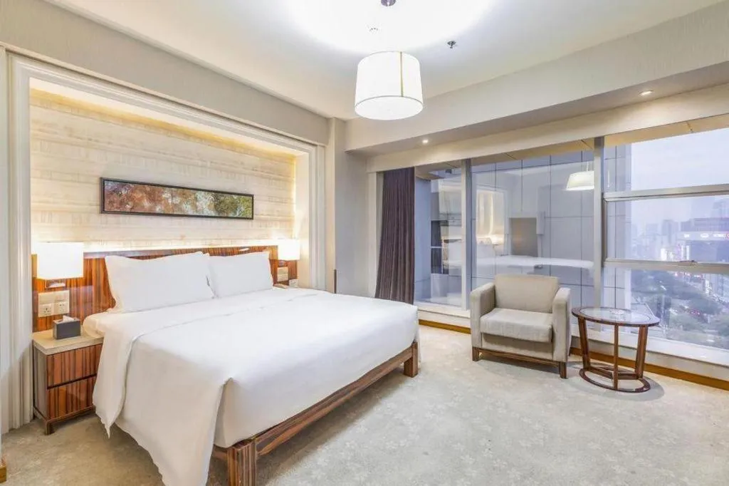 Bed in YUN-RAY Ambassador Hotel