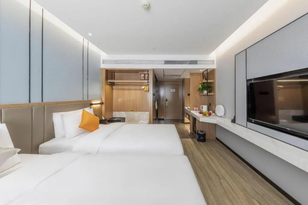 Bed in YUN-RAY Ambassador Hotel