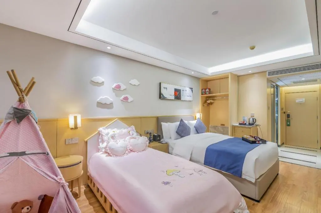 Bed in YUN-RAY Ambassador Hotel