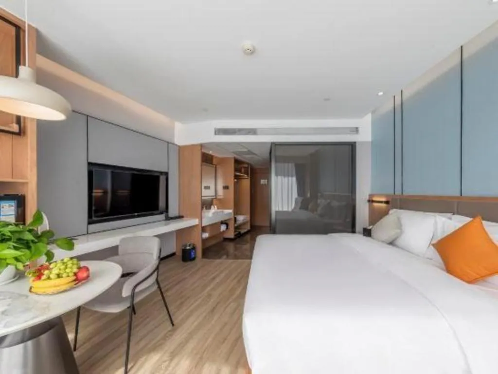 Bed in YUN-RAY Ambassador Hotel