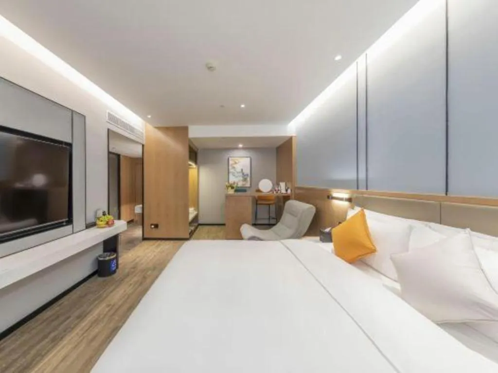 Bed in YUN-RAY Ambassador Hotel