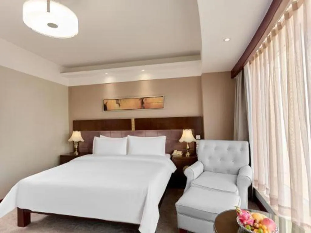 Bed in YUN-RAY Ambassador Hotel